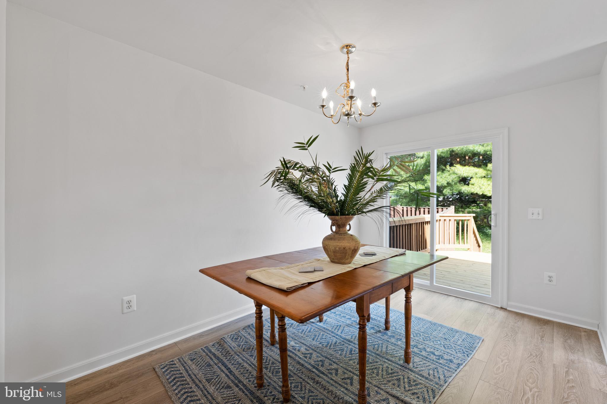 637 Howards Loop Annapolis, MD 21401 - Photo 9 of 38 Dining Room off Kitchen with Slider to Deck