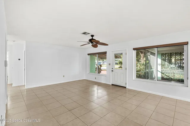 a view of livingroom with furniture wooden floor and window