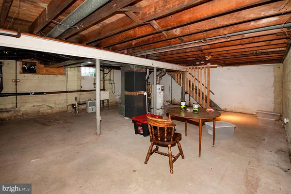 a view of a dinning table and chairs in patio
