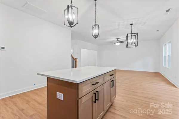 a view of kitchen and sink