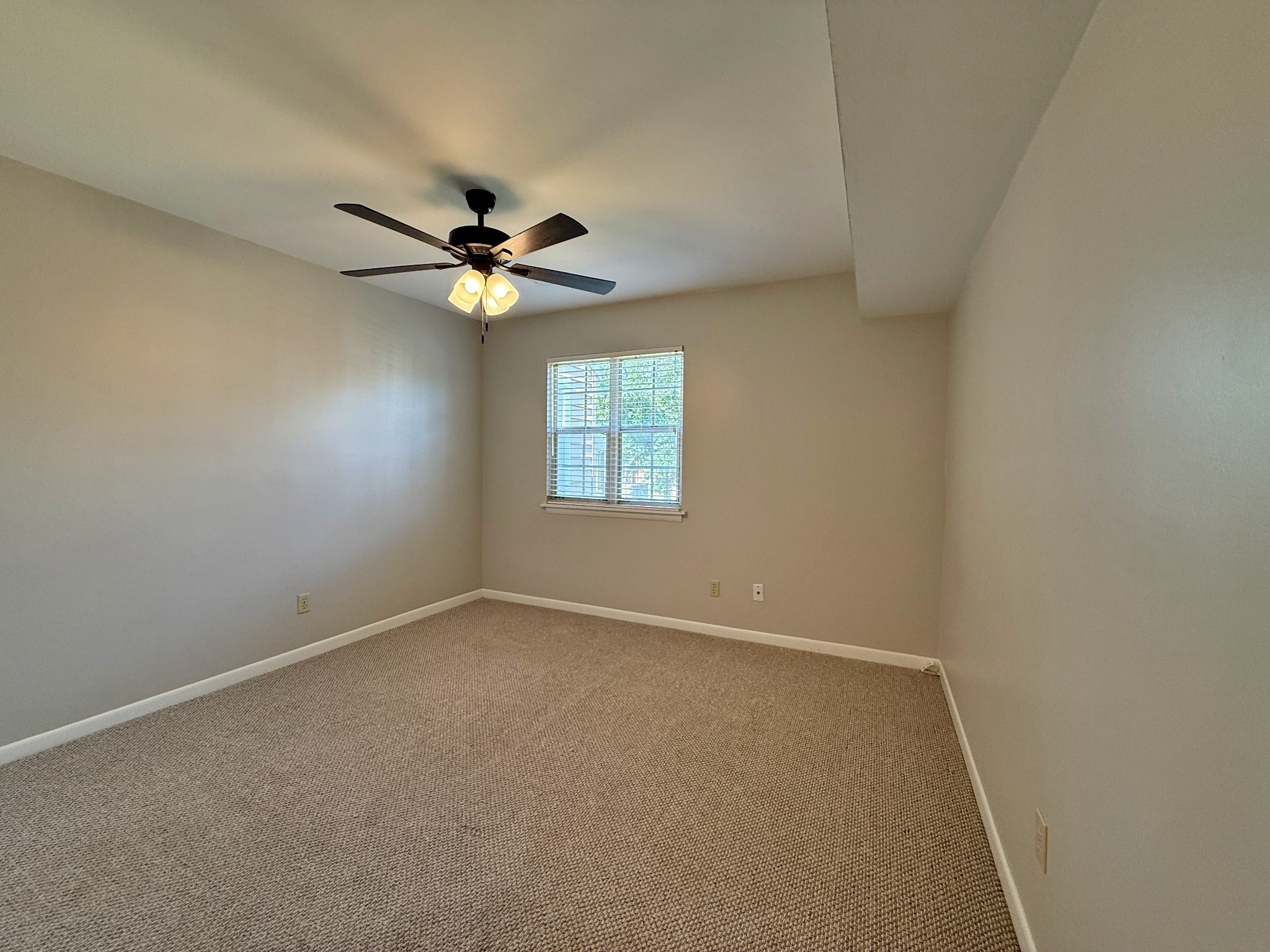 1702 Granville Road Franklin, TN 37064 - Photo 22 of 26 an empty room with windows and fan