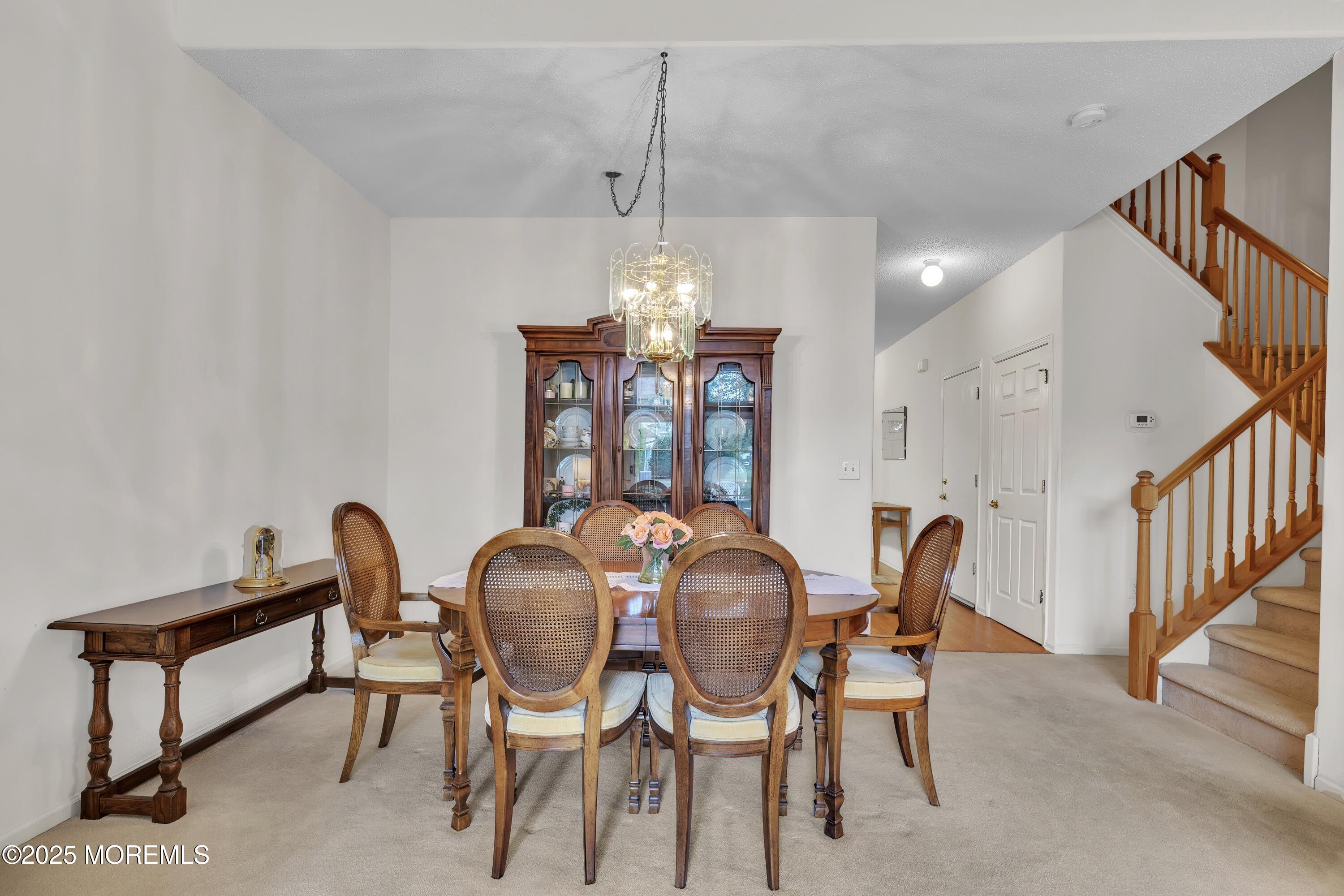 11 Riva Boulevard Brick, NJ 08723 - Photo 18 of 42 a dining room with furniture and window