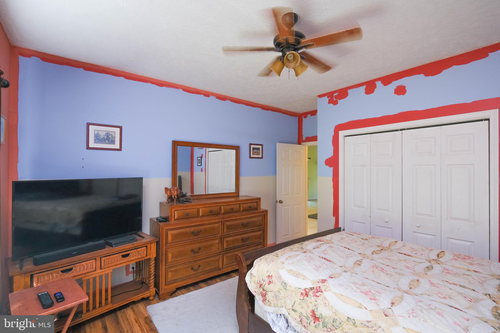 1195 Shangri-La Road Bentonville, VA 22610 - Photo 56 of 64 a bedroom with a bed and flat screen tv