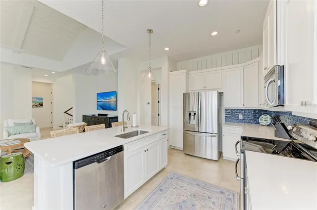 a en suite bathroom with a sink and a window