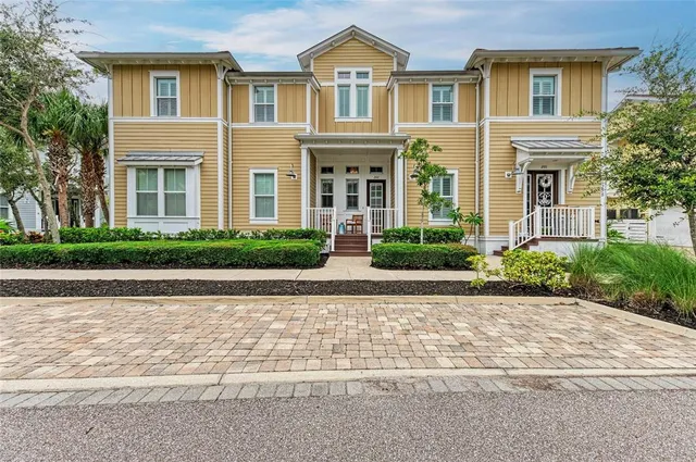 a outdoor living space with furniture and a potted plant