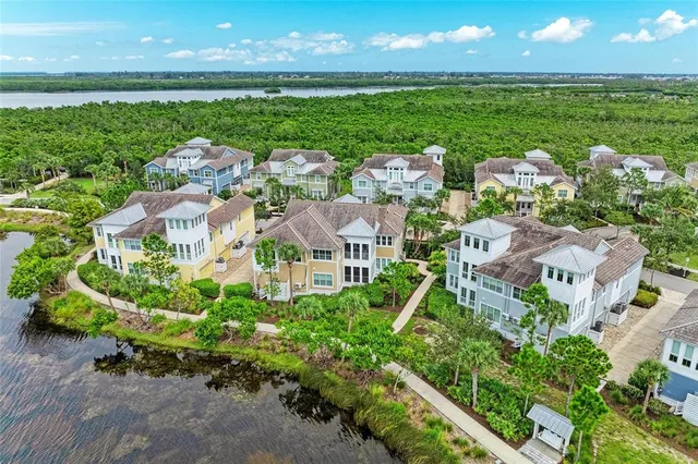 a view of swimming pool with a table and chairs