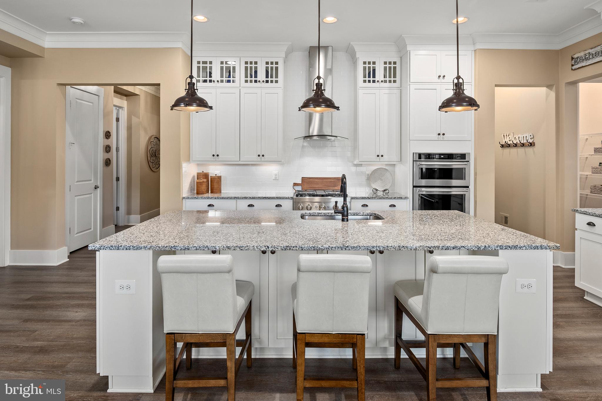 44 Lively Stream Way Gettysburg, PA 17325 - Photo 11 of 70 a kitchen with a sink a refrigerator and chairs