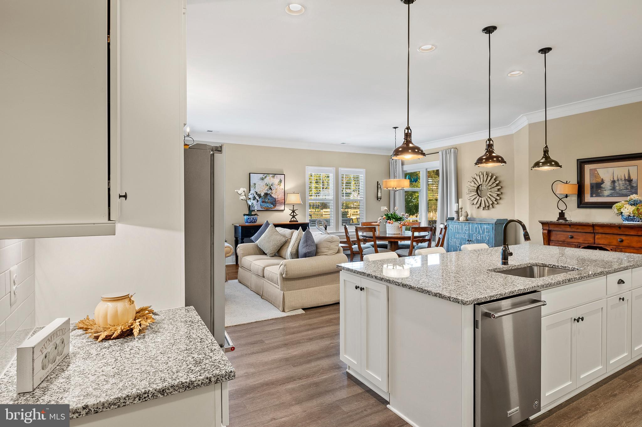44 Lively Stream Way Gettysburg, PA 17325 - Photo 12 of 70 a view of kitchen island with stainless steel appliances granite countertop sink and living room view