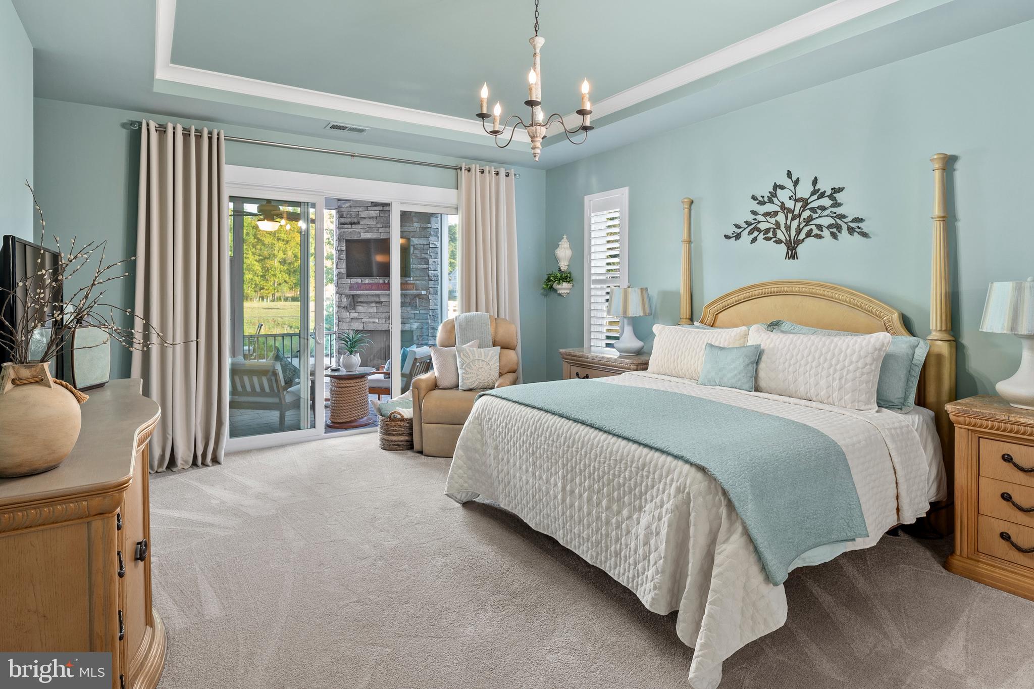 44 Lively Stream Way Gettysburg, PA 17325 - Photo 21 of 70 a bedroom with a bed and a chandelier