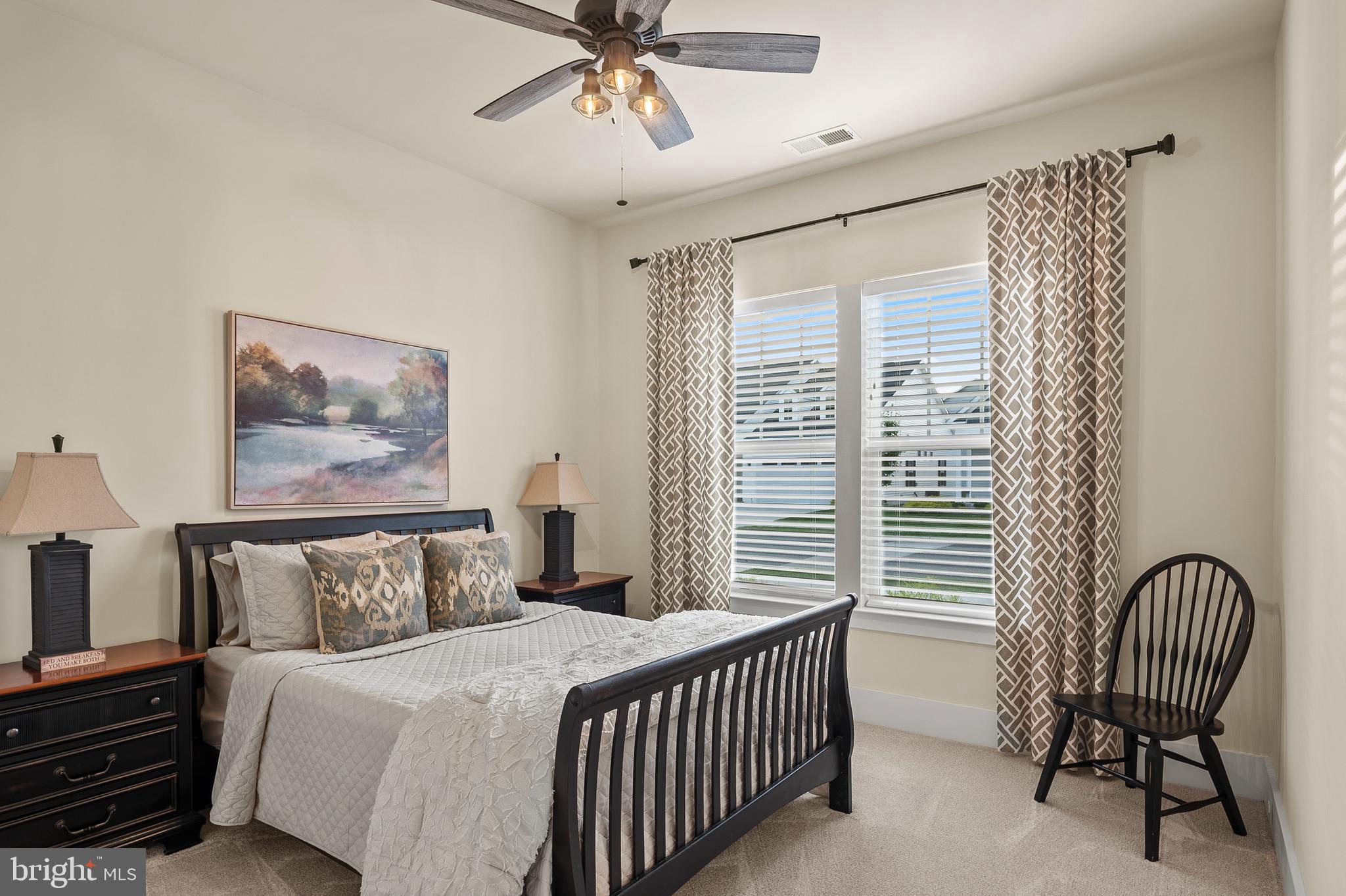 44 Lively Stream Way Gettysburg, PA 17325 - Photo 28 of 70 a bedroom with a bed and a chandelier