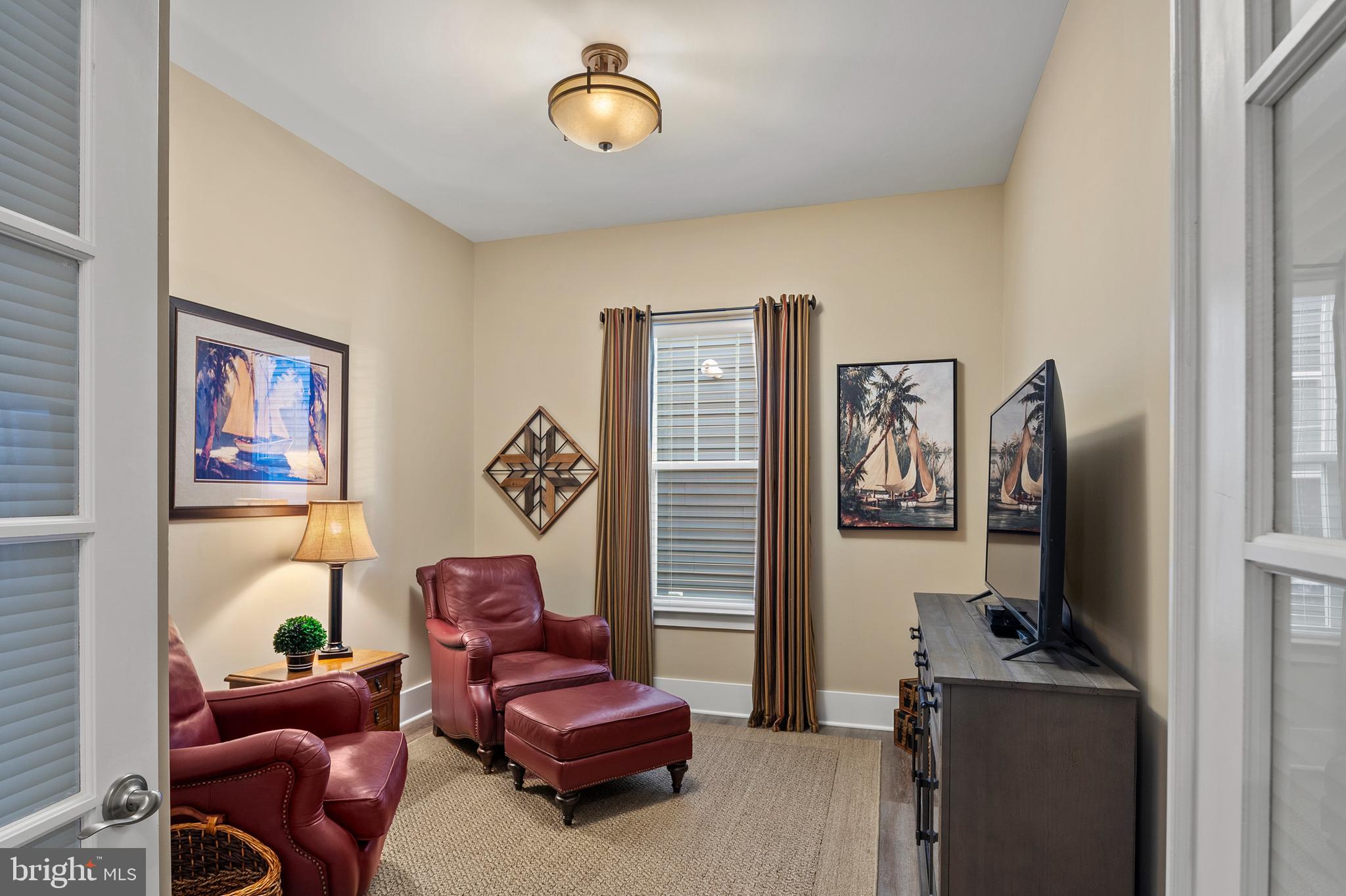 44 Lively Stream Way Gettysburg, PA 17325 - Photo 29 of 70 a living room with furniture a flat screen tv and a window