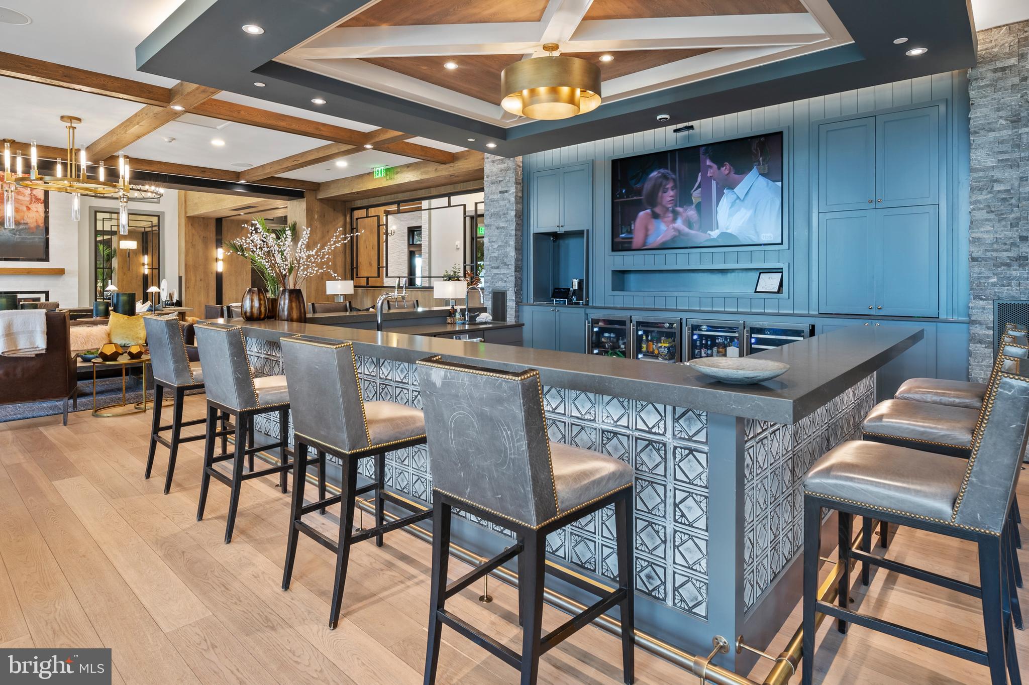 44 Lively Stream Way Gettysburg, PA 17325 - Photo 52 of 70 a kitchen with stainless steel appliances granite countertop a stove a refrigerator a dining table and chairs