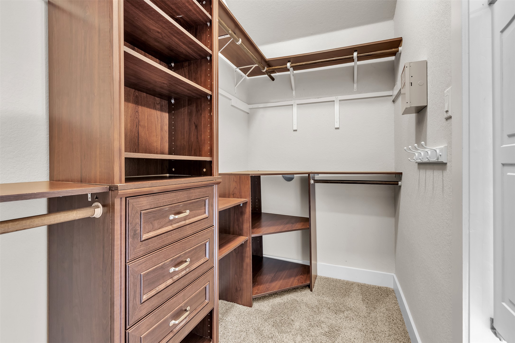 12212 Tawny Farms Road, Unit 142 Austin, TX 78748 - Photo 13 of 21 Organized living made easy with this custom-designed walk-in closet featuring built-in shelving and drawers.
