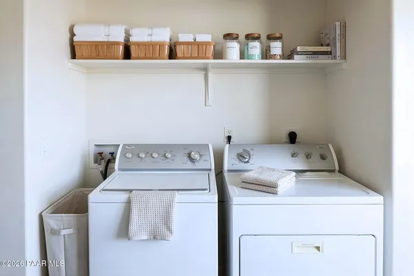 a utility room with dryer and washer