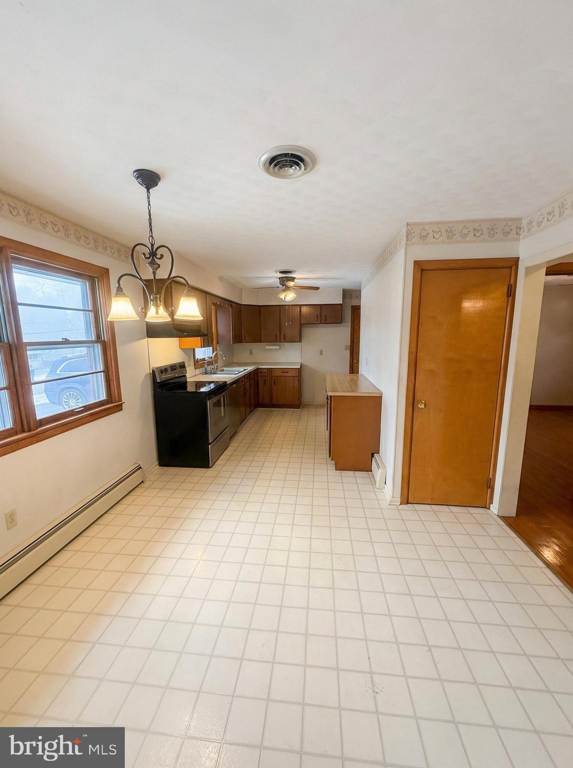 100 Clover Hill Road Dallastown, PA 17313 - Photo 12 of 20 a bedroom with a bed and dresser with mirror