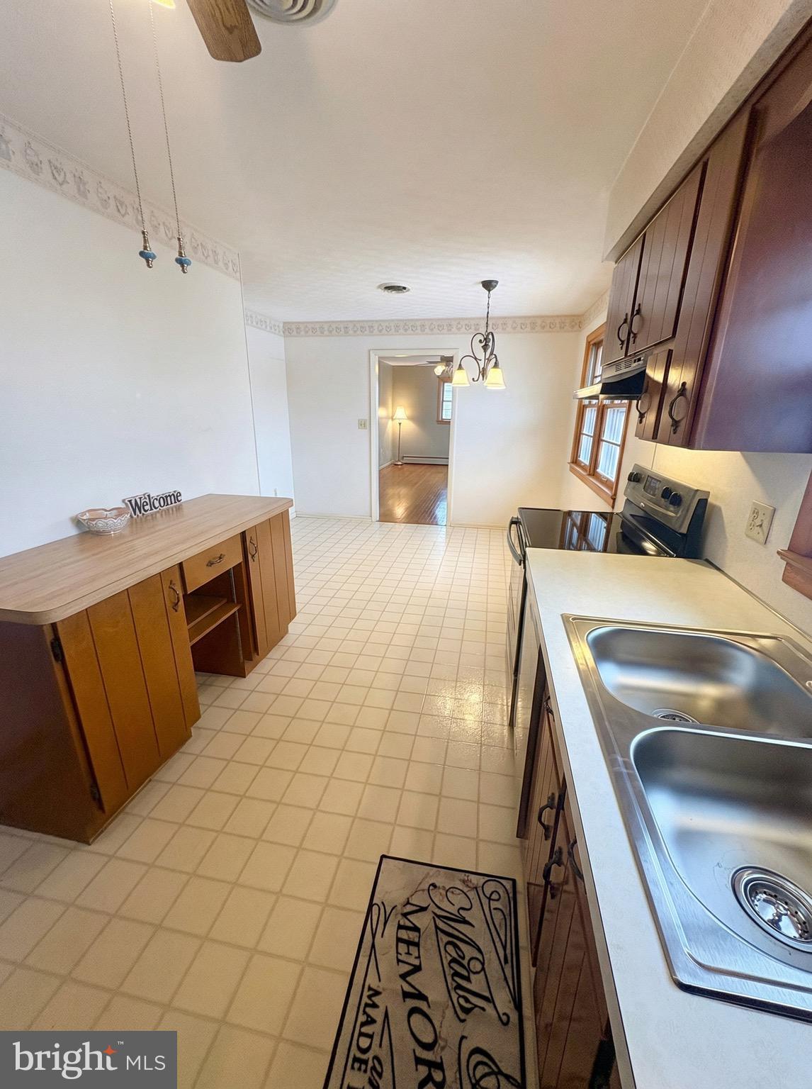 100 Clover Hill Road Dallastown, PA 17313 - Photo 15 of 20 a kitchen that has a sink and a stove