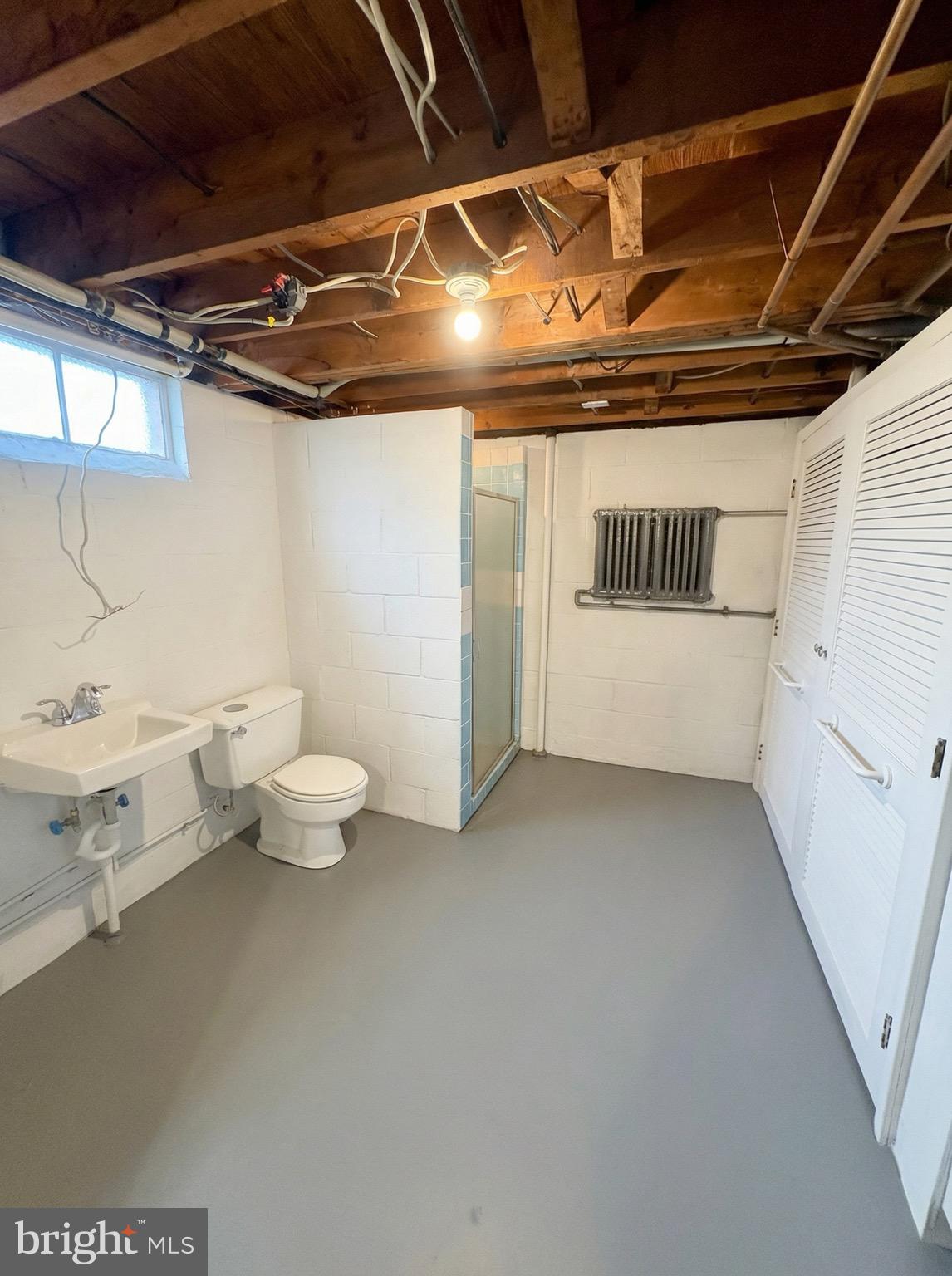 100 Clover Hill Road Dallastown, PA 17313 - Photo 18 of 20 a view of a room with exposed radiator and stove