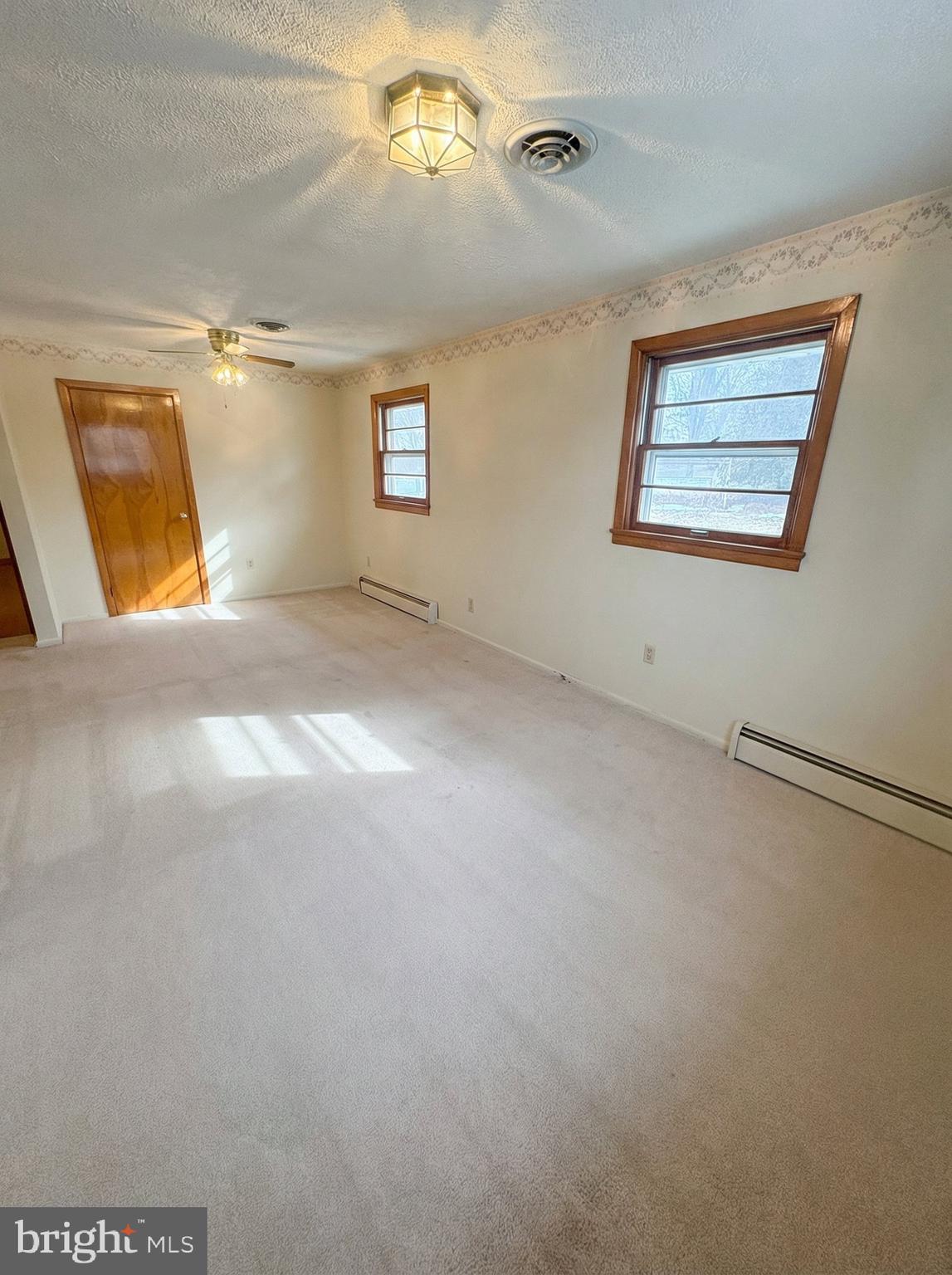 100 Clover Hill Road Dallastown, PA 17313 - Photo 6 of 20 a view of an empty room with a window