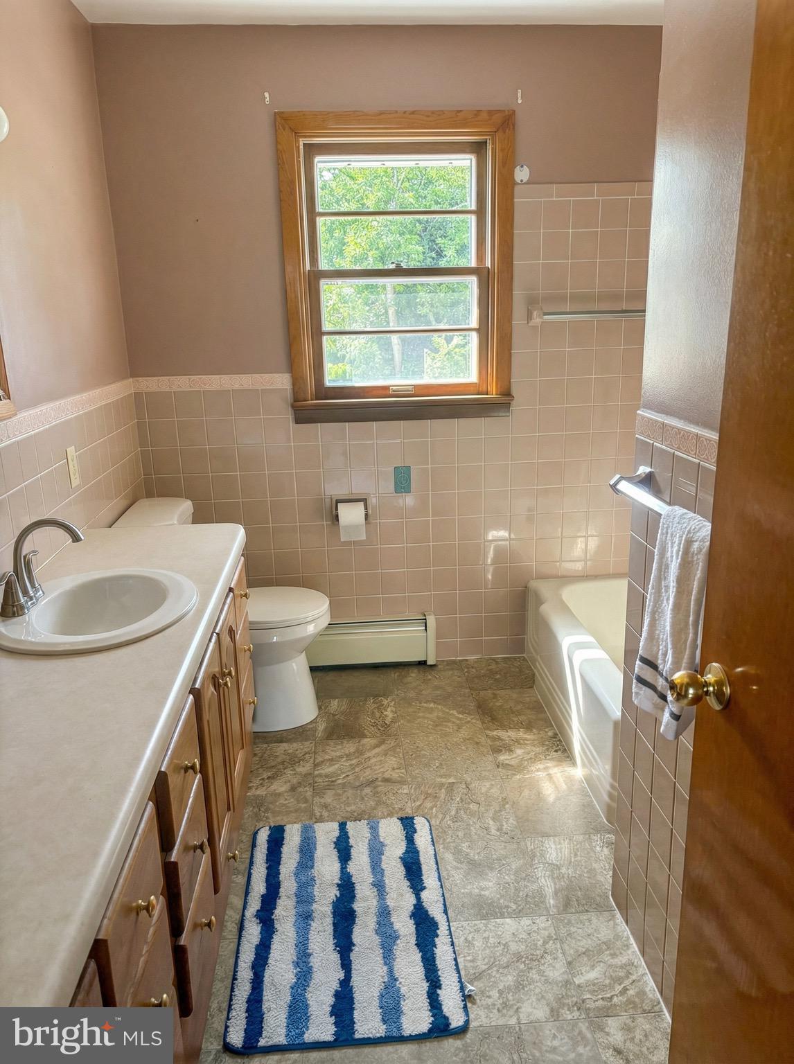 100 Clover Hill Road Dallastown, PA 17313 - Photo 7 of 20 a bathroom with a sink toilet and shower