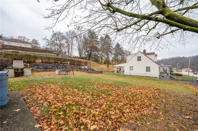 a view of a chairs and table in the patio