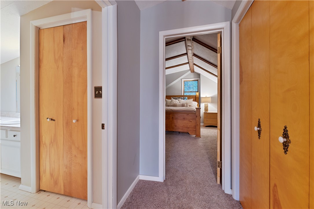 6370 Fairview Road Youngstown, OH 44515 - Photo 21 of 38 Hall with light carpet and baseboards
