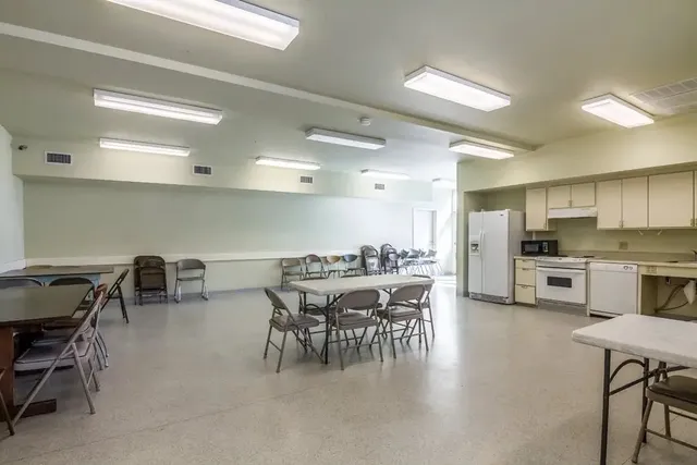 a view of a dining room with furniture
