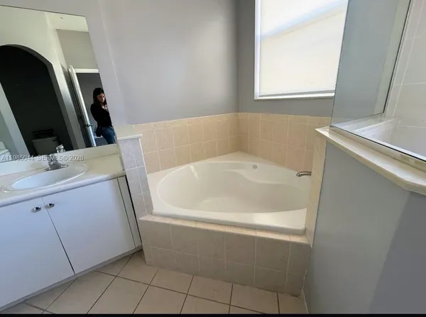 a bathroom with a bathtub