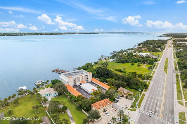 a view of a lake with a yard