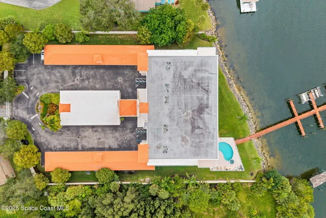 a view of swimming pool from a balcony