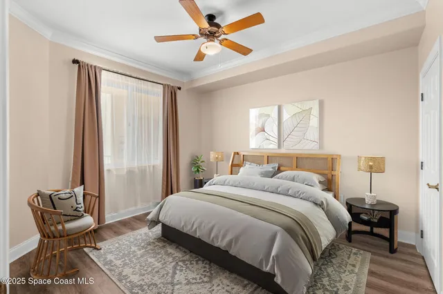 a bedroom with a bed chair and window