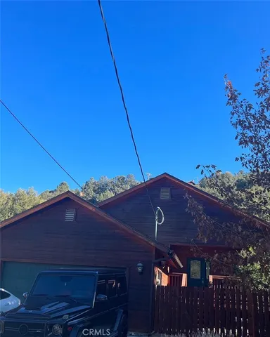 a view of house with an outdoor space