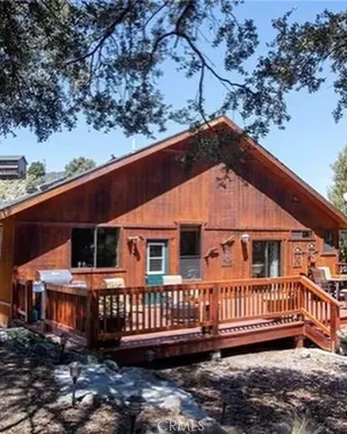 a view of a house with a deck