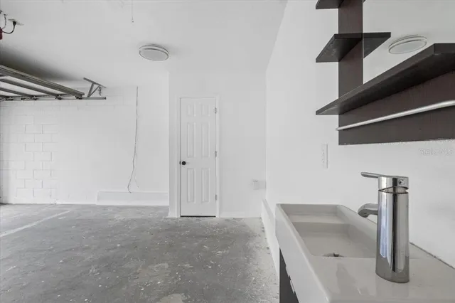 a bathroom with a sink and a shower