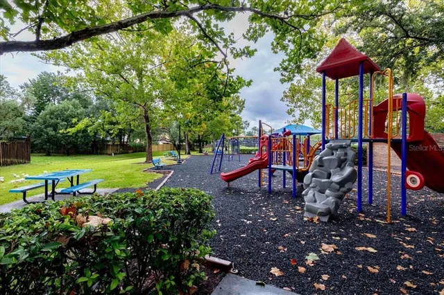 a view of a chairs in a backyard