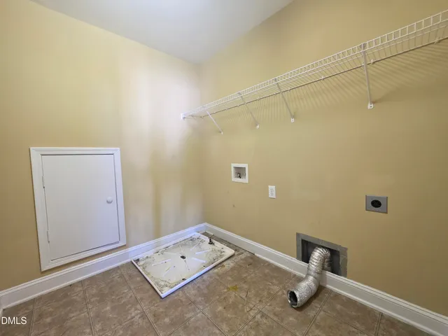 a room with a table and a window