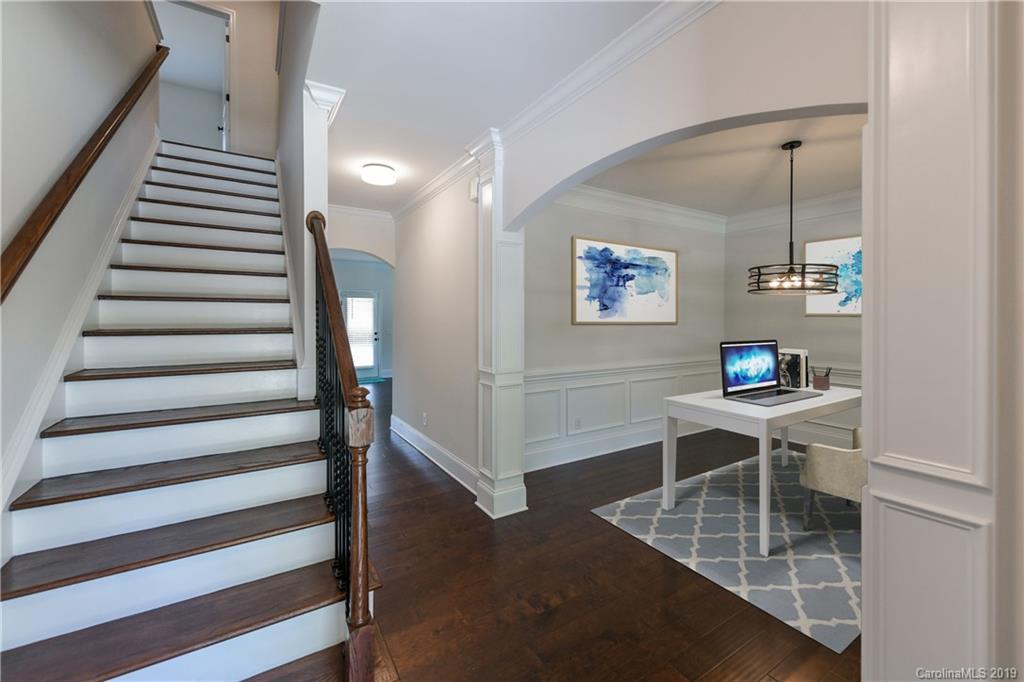 5810 Carmel Road Charlotte, NC 28226 - Photo 2 of 31 a view of a hallway with seating area