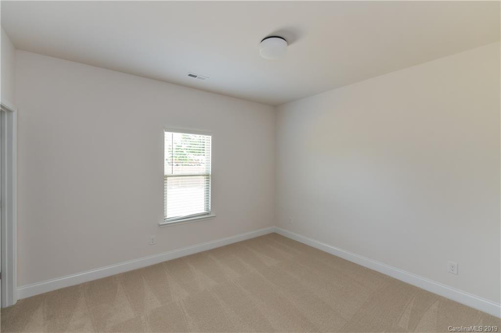 5810 Carmel Road Charlotte, NC 28226 - Photo 25 of 31 a view of a window in an empty room