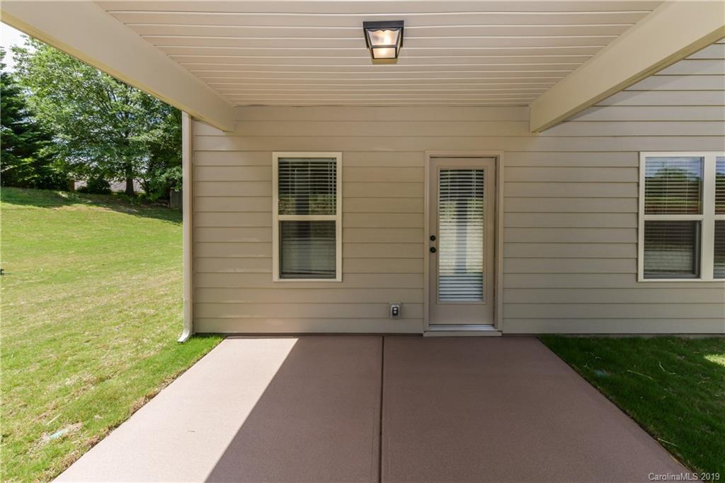 5810 Carmel Road Charlotte, NC 28226 - Photo 31 of 31 a view of front door of house and yard