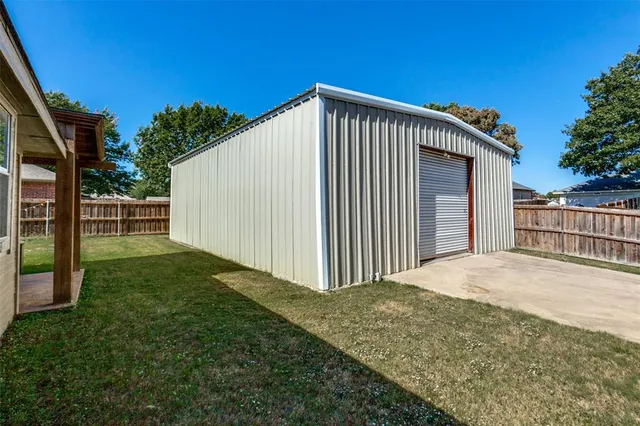 a view of a backyard with a plants