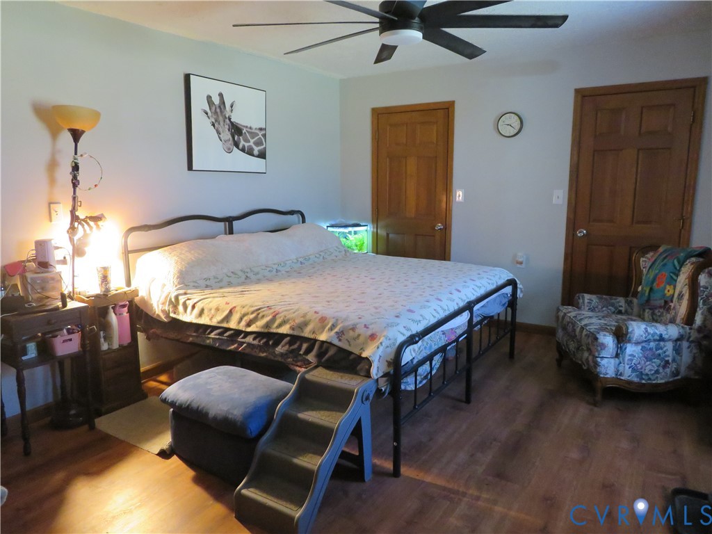 44 Adsit Lane Freeman, VA 23856 - Photo 44 of 58 a bed sitting in a bedroom next to a window