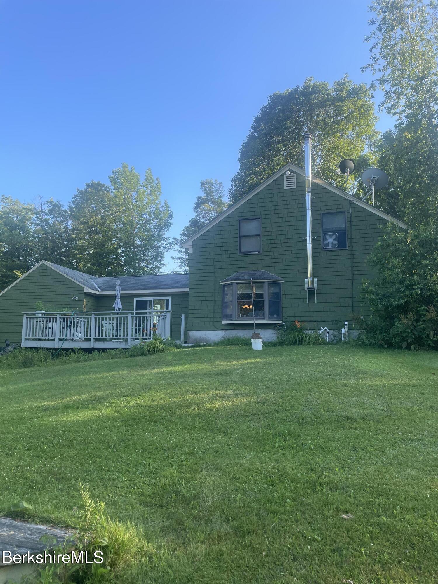 14 Blotz Road Washington, MA 01223 - Photo 2 of 28 a front view of a house with garden