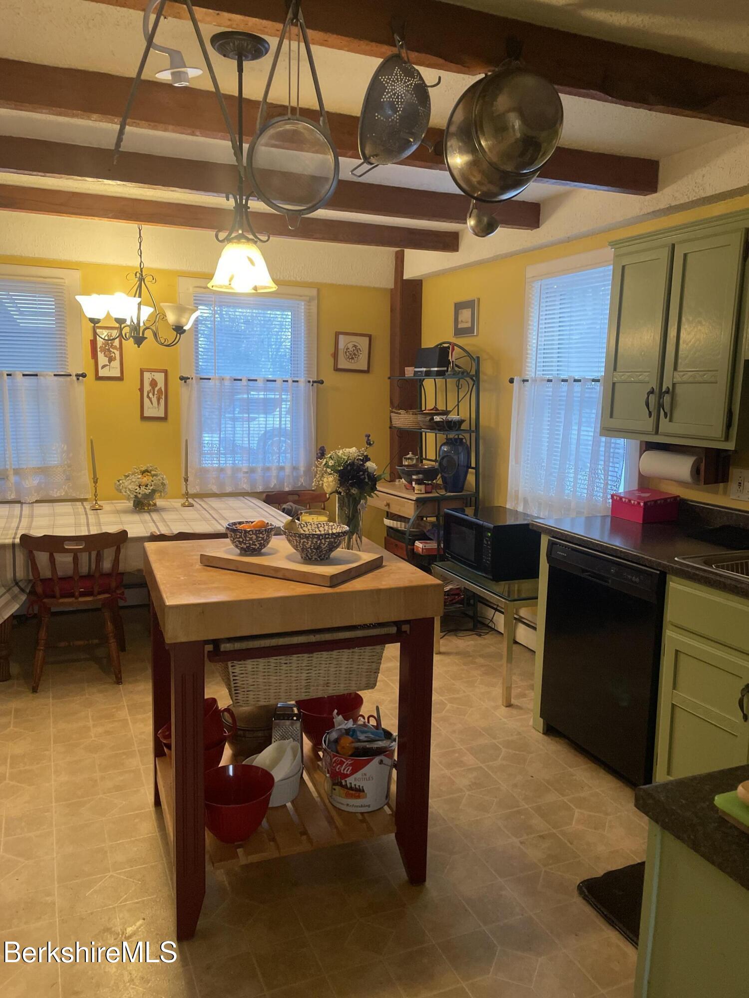 14 Blotz Road Washington, MA 01223 - Photo 6 of 28 a living room with a table and chairs