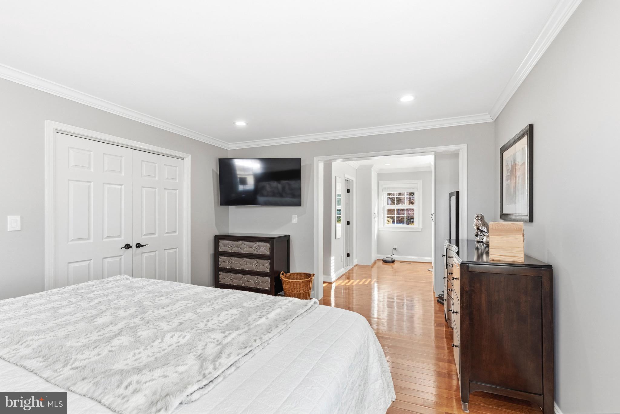 6837 White Rock Road Sykesville, MD 21784 - Photo 14 of 36 a bedroom with a bed and wooden floor