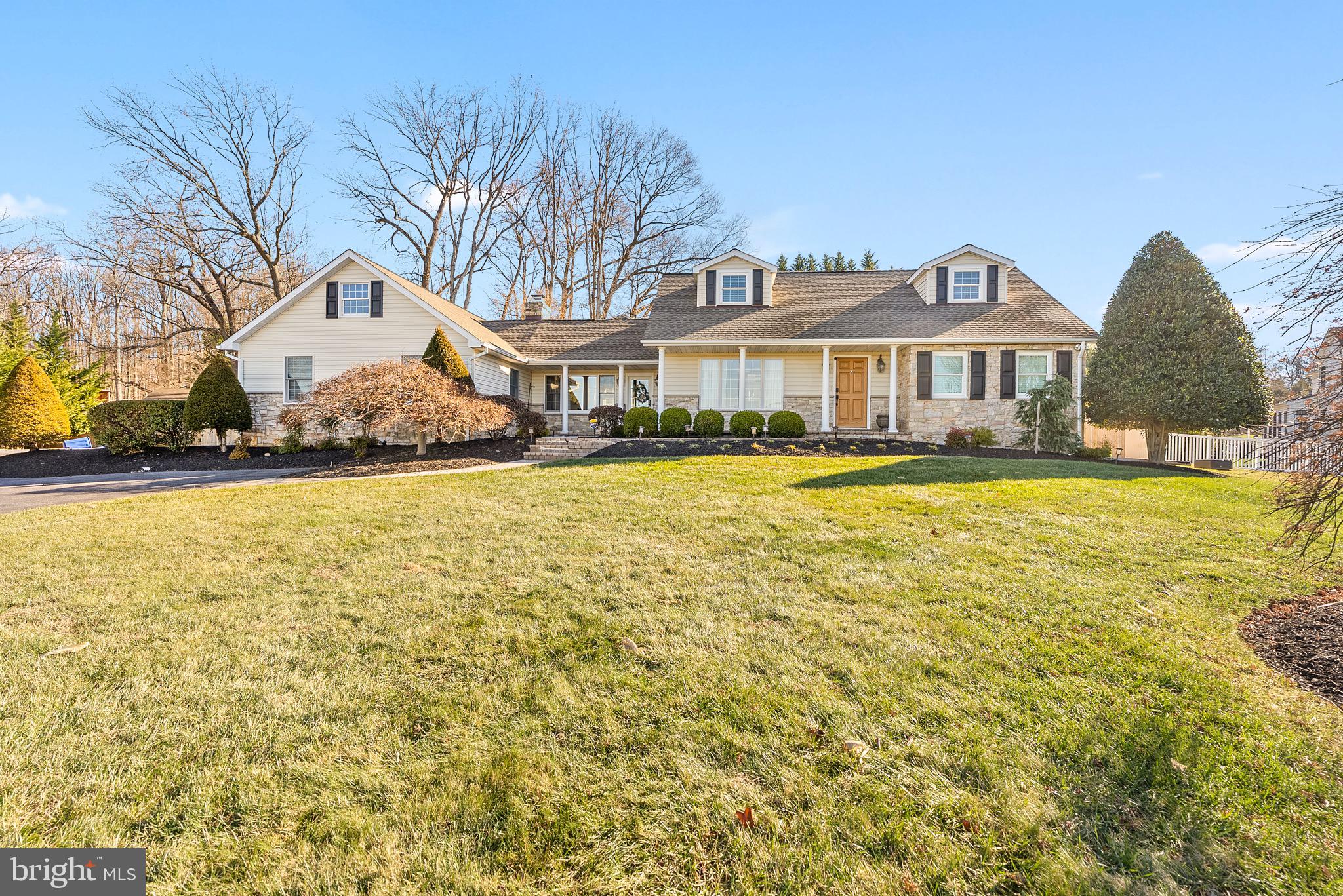 6837 White Rock Road Sykesville, MD 21784 - Photo 2 of 36 a view of a house with a big yard and large trees