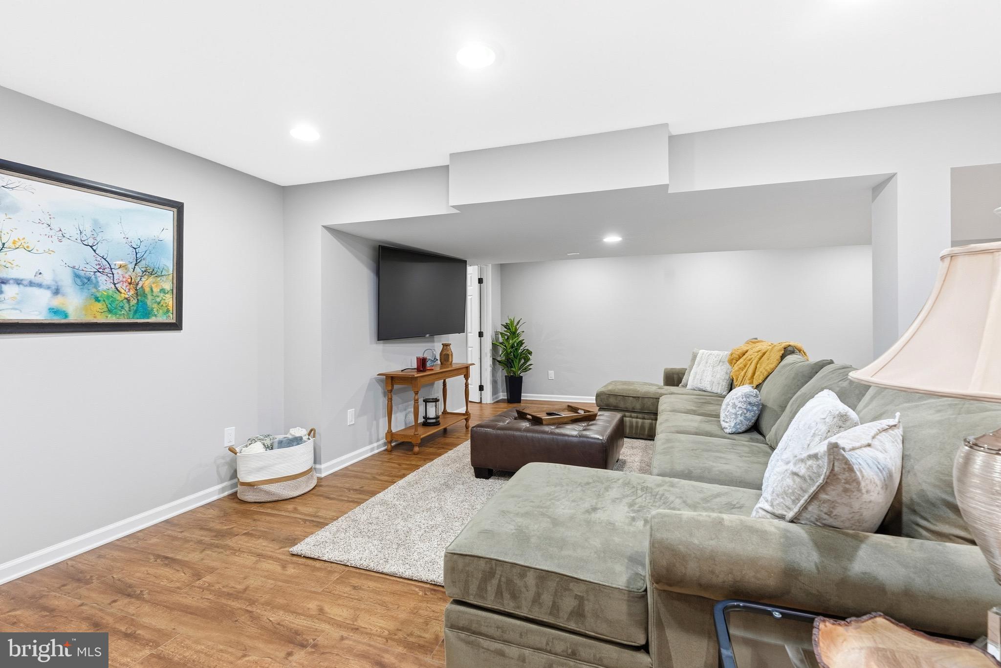 6837 White Rock Road Sykesville, MD 21784 - Photo 25 of 36 a living room with furniture and a flat screen tv