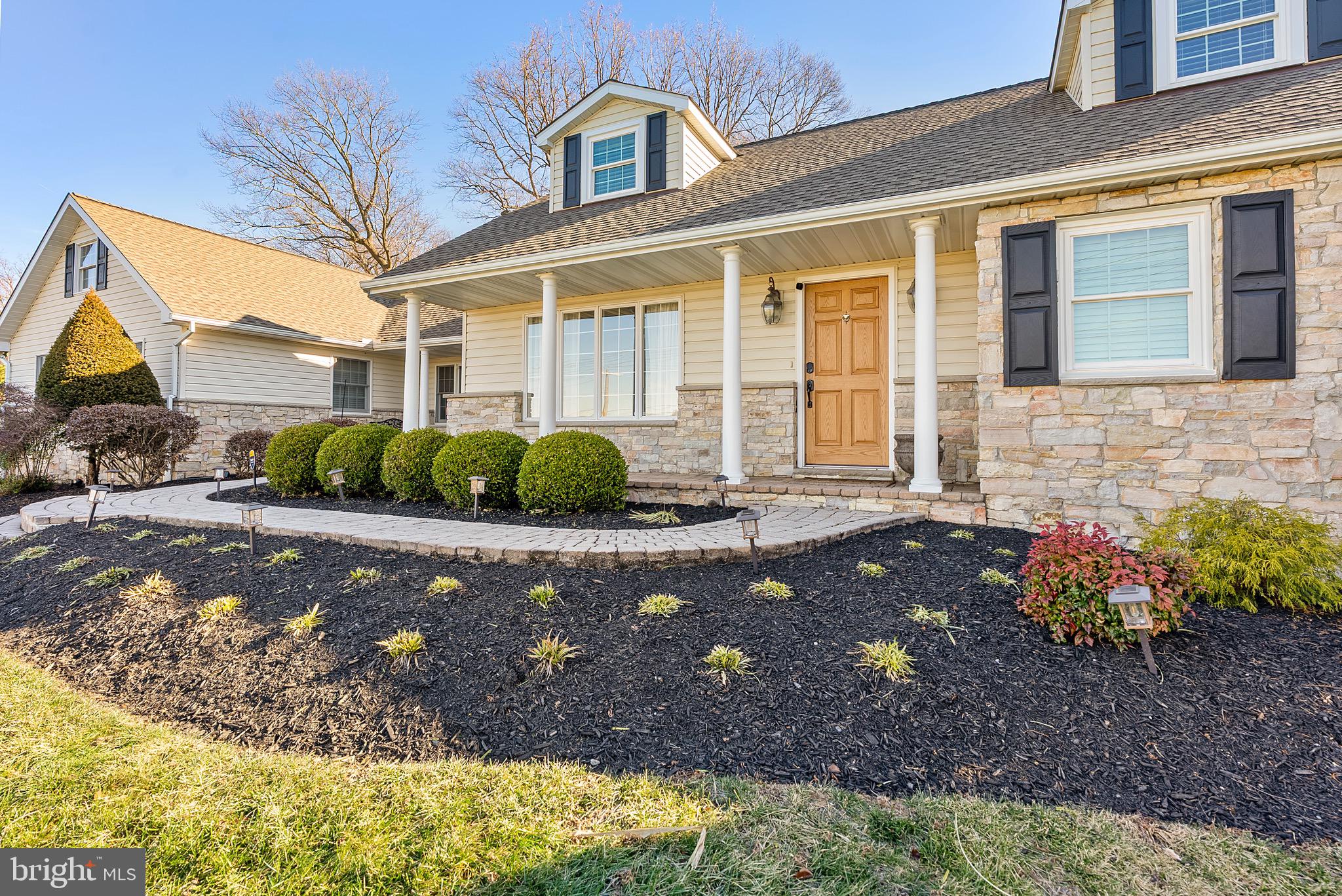 6837 White Rock Road Sykesville, MD 21784 - Photo 3 of 36 a front view of a house with a yard