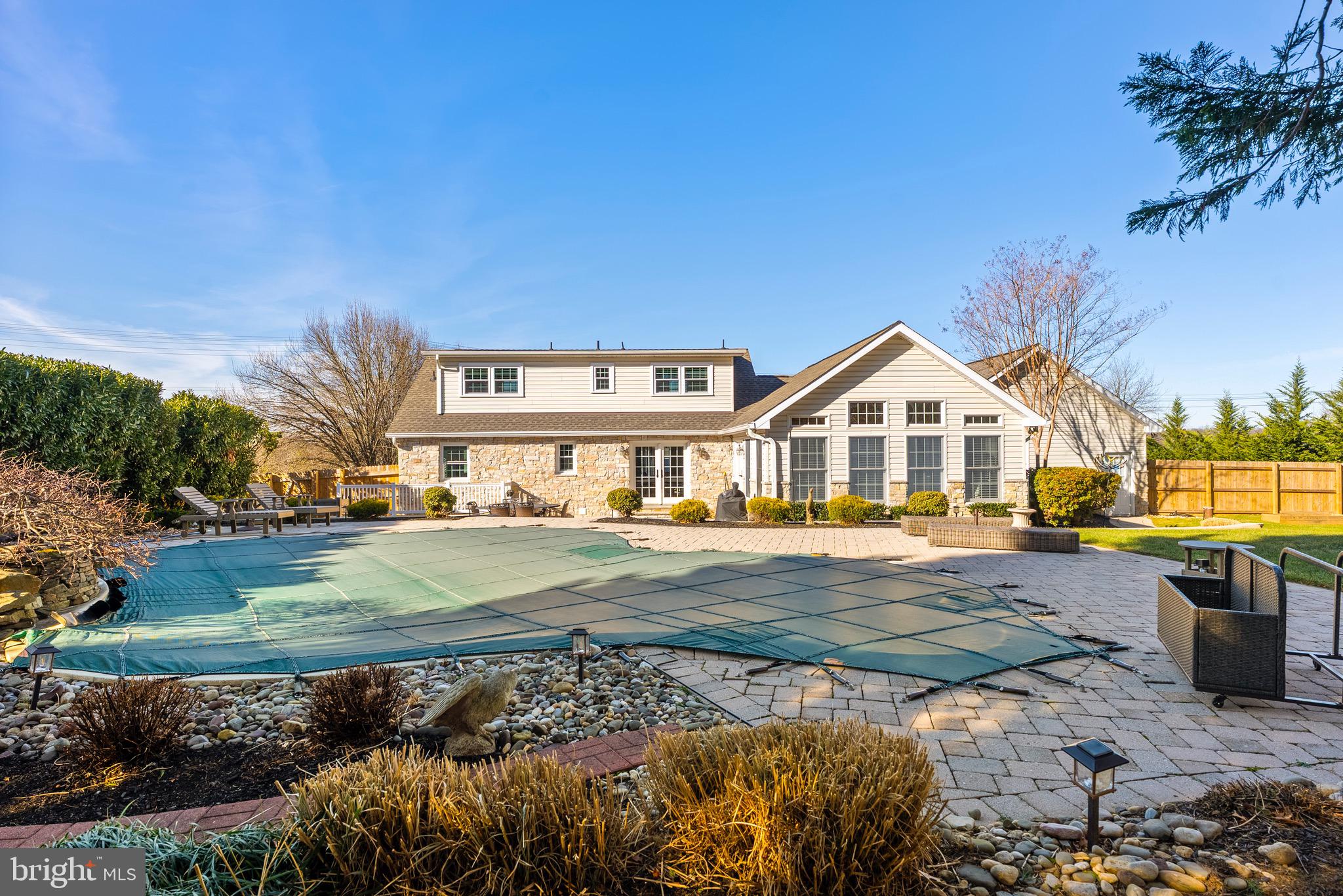 6837 White Rock Road Sykesville, MD 21784 - Photo 33 of 36 a front view of a house with garden