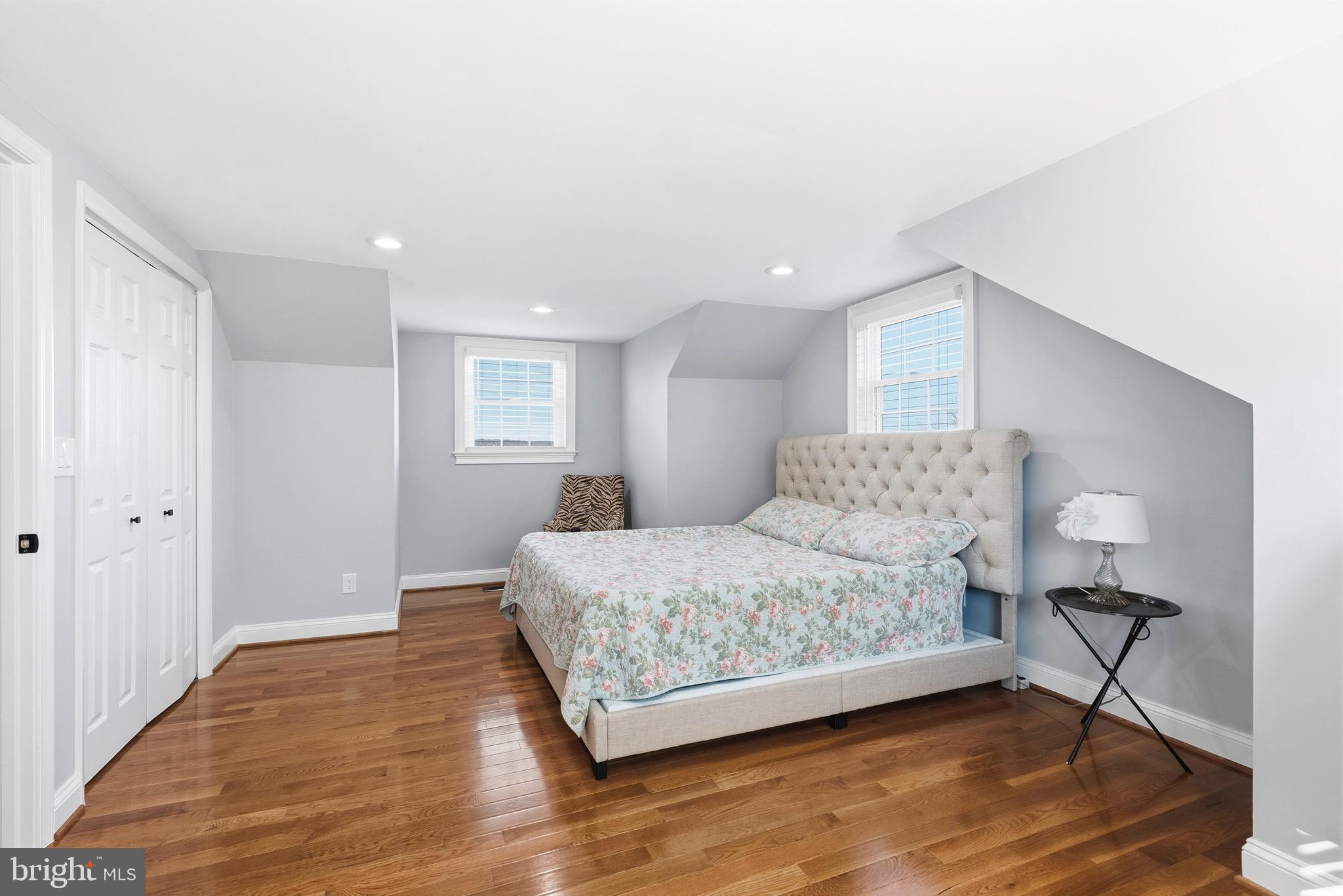 6837 White Rock Road Sykesville, MD 21784 - Photo 4 of 36 a spacious bedroom with a bed and a table in it