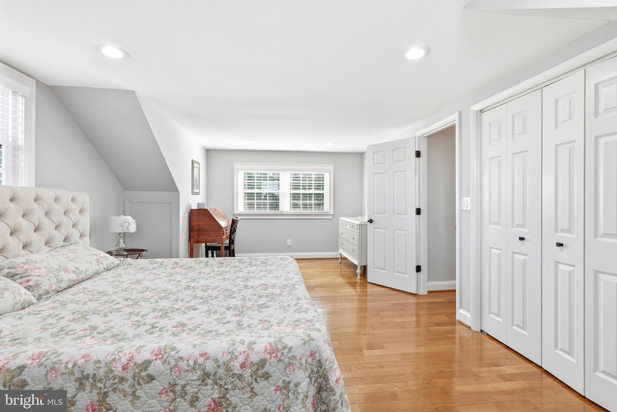 6837 White Rock Road Sykesville, MD 21784 - Photo 5 of 36 a large bedroom with a large bed and wooden floor