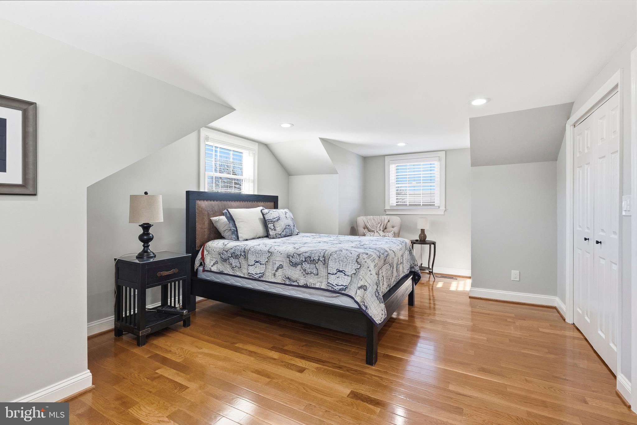 6837 White Rock Road Sykesville, MD 21784 - Photo 6 of 36 a bedroom with a bed and wooden floor
